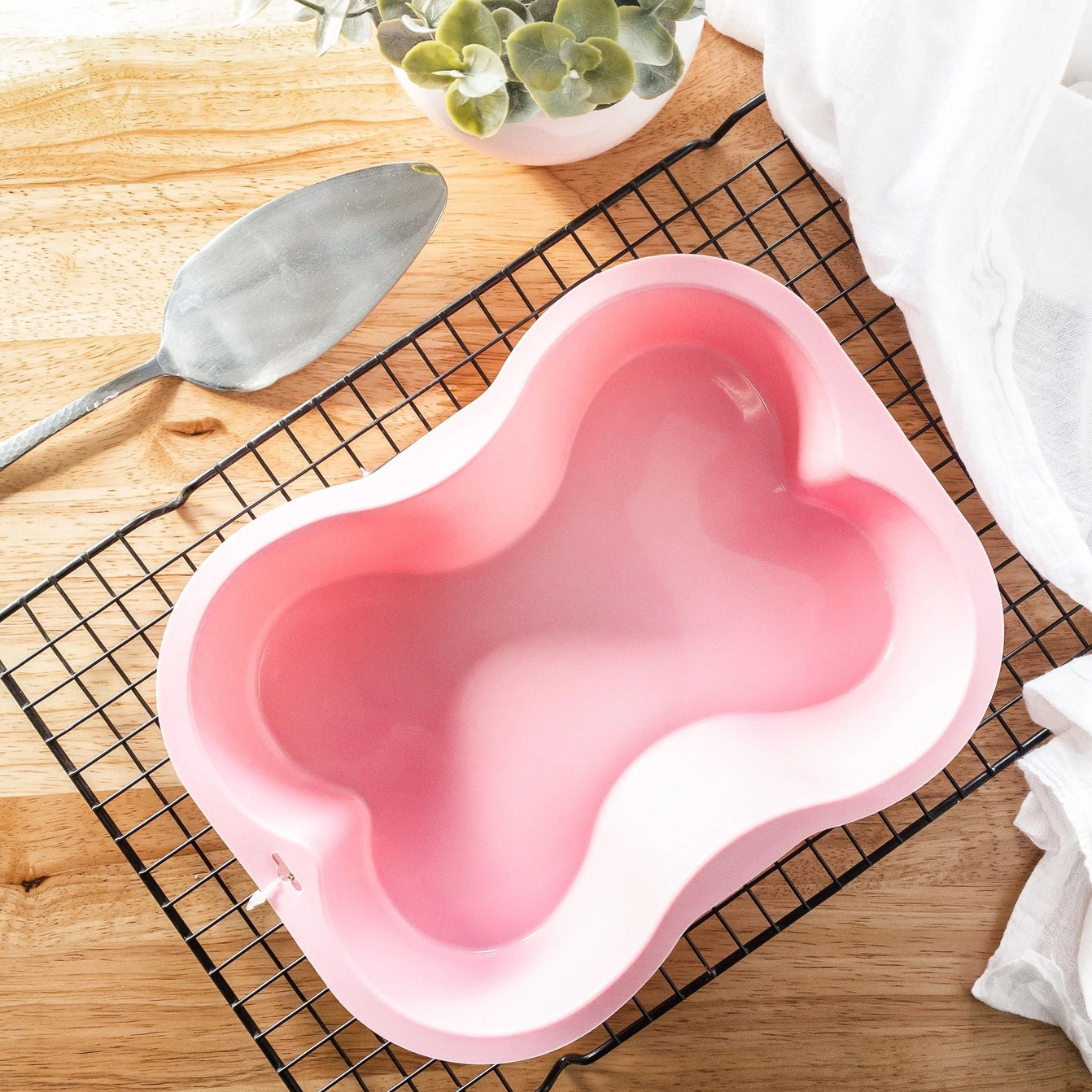 Pink Dog Bone Shaped Silicone Cake Pan